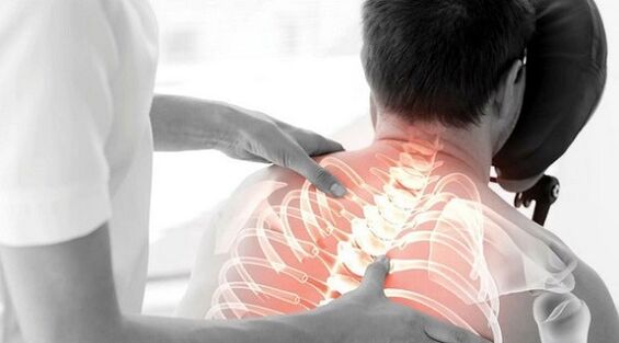 doctor's examination for back pain under the left shoulder blade