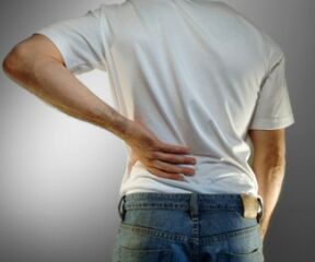 Pain in the lower back is a symptom of osteochondrosis